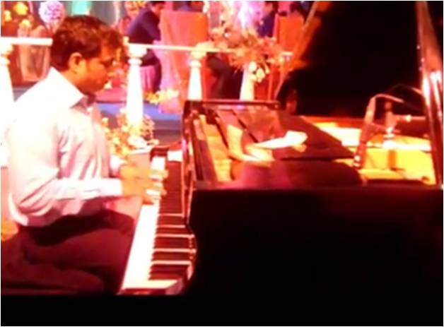 male piano player agra